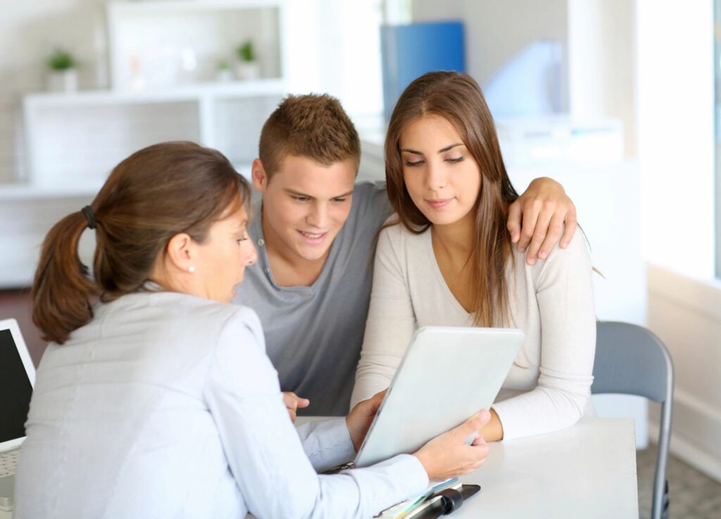 Customers reviewing electrical project financing options